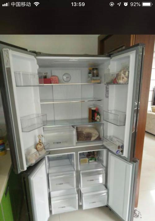冰柜带电处理方法（安全处理带电冰柜的有效方法）