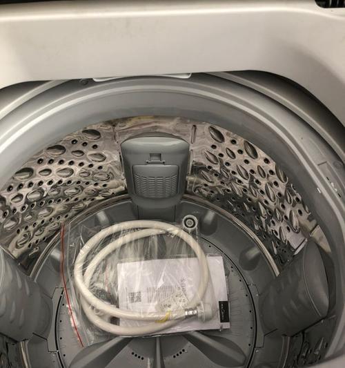 解决海尔洗衣机不脱水显示E1问题的方法（海尔洗衣机清洗维护的关键步骤）